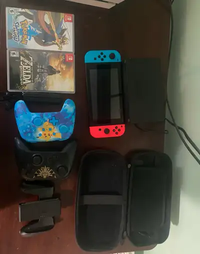 Nintendo Switch + 120Gb SD card and extra controller and games, View more