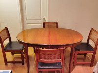 Chocolate Colored Oval Wooden Table (With Extention and Chairs)