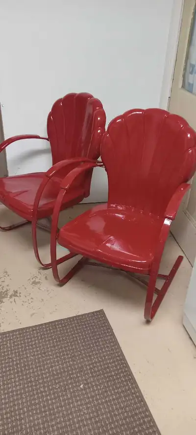  Two metal clam shell garden chairs, View more