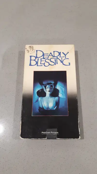 * * Please Read * * Location East Ottawa VHS Deadly Blessing 1981 Horror/Mystery When a member of an...