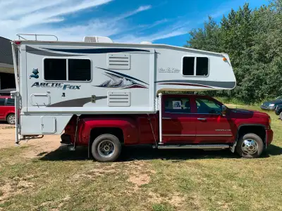 Four season Artic Fox Truck Camper in mint condition c/w generator and one slide. Solar Panel, Fridg...