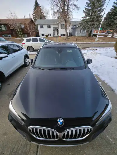 I'm selling my sleek, black 2021 BMW X1 xDrive28i, a sporty and versatile SUV with a 2.0L Turbo I4 e...