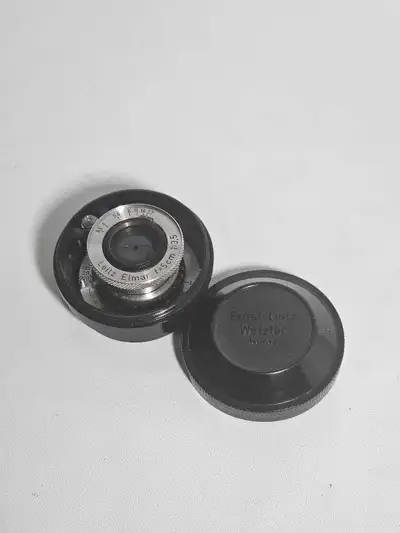 Leitz Leica 50mm f3.5 Elmar. Collapible, L39 Ltm. Excellent condition. Includes rear metal cap and S...