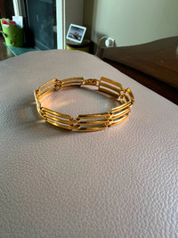 Costume Jewellery gold bracelet by Monet $5