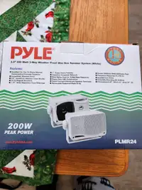 Set of weatherproof speakers new in box