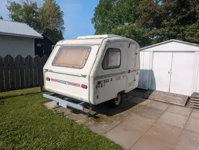 Light weight fiberglass camper. About 6 x 9 feet. Has elect/propane fridge and two burner propane st...