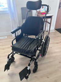 Tilting wheelchair 