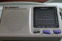 BELL AND HOWELL AM/FM/SHORTWAVE PORTABLE RADIO RECEIVER
