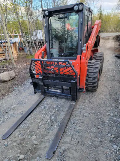 2022 Kubota SSV75 skid steer. 228 hours. Standard flow, quick attach. Comes with 3 attachments: dirt...