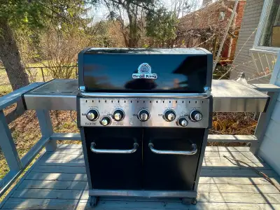Used Broil King Baron 5-burner gas BBQ. Stainless steel. Side burner. Some staining and wear. Needs...