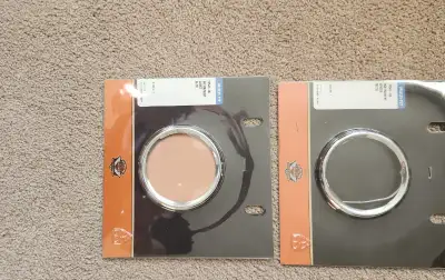 I have for sale 2 chrome 4” bezel covers Harley part # 74541-00 new in package asking $25.00