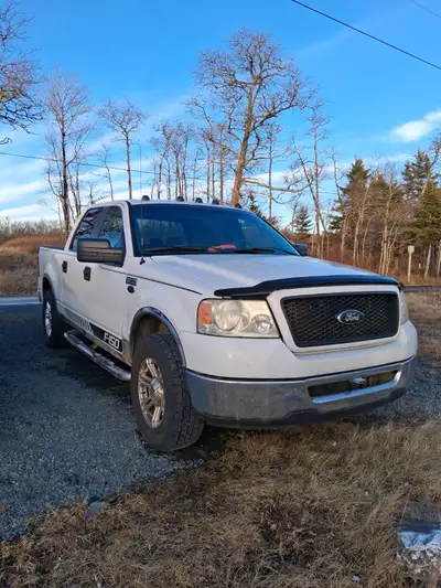 Selling 2006 f150 2wd 4.6 lt auto xl tires good , after market alloys ,,new front brakes and bearing...