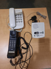 Several home “landline” pushbutton phones, 1 answering machine.
