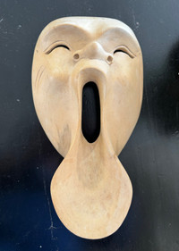 Carved wood mask decor