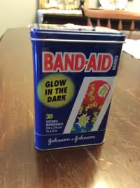 Small band-aid tin from the 80’s with “rad” and “tubular”, $5 on