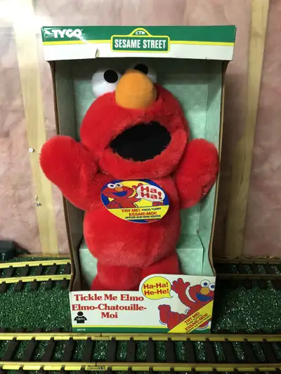 Vintage Tickle Me Elmo new in box! Still works !, View more