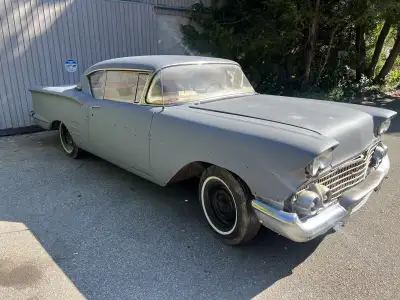1958 Chevrolet Impala 2dr car is in primer needs some body work very solid start floors are good one...