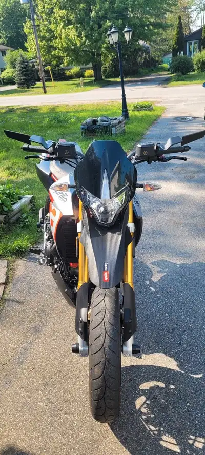 Aprilia dorsoduro 900, in excellent shape, needs nothing for safety. Dominator slip ons and after ma...