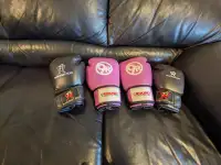 Both pairs of Boxing gloves 