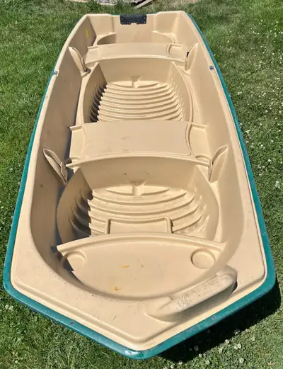 12 FT Dolphin Jon boat , no leaks , good shape , approx 110 lb weight , electric minn Kota motor neg...
