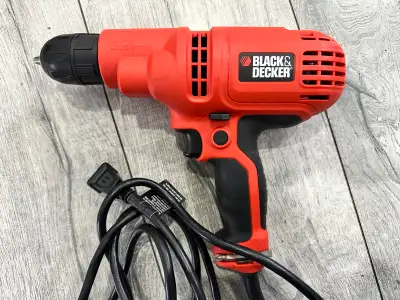 Black and Decker Drill used like with carry case , View more