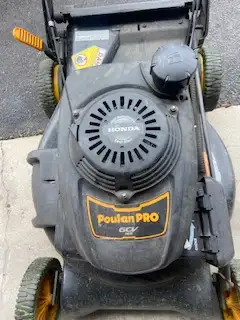 Gas-powered, walk-behind lawn mower from the Poulan Pro brand. Runs well. Does not have a bag but do...