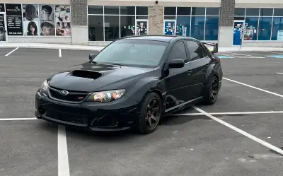 Up for sale is my 2011 Subaru WRX STI, a performance sedan that blends power and practicality with a...
