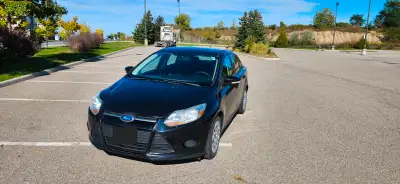 Looking for a reliable and fuel-efficient vehicle? Check out this well-maintained 2013 Ford Focus SE...