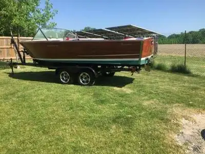 Mint condition, 1966 Century Resorter - 18 ft wood boat with no soak bottom and sapellie planking. B...