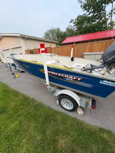 Impeccable boat motor and trailer 4 yr old 25 hp electric start tiller. -Fresh oil top and bottom -N...