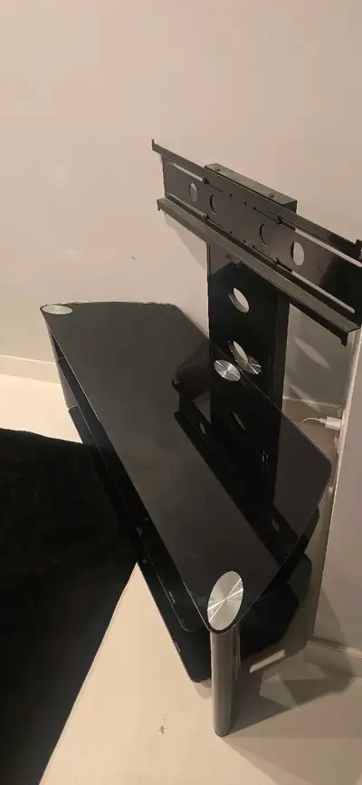 Black Glass and Metal Entertainment Unit/TV Mount. Adjustable Height Fits all sized TVs Universal Mo...