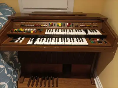 Bring home the rich, classic sound of this vintage Yamaha Electone organ, which remains in good cond...