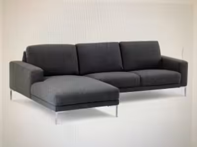 This left- hand facing chez sectional is upholstered in a grey/white/black mix tweed fabric. It’s si...