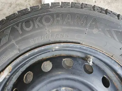 Yokohama ice guard G075 215/70R16 Like new condition on rims (5x114.3 bolt pattern) Tread is 11/32,...