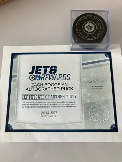 Zach Bogosian Signed Puck, View more