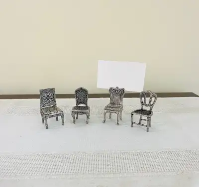 These Metal Mini Pewter Card Holder Chairs by New View are a stylish and practical accessory for you...