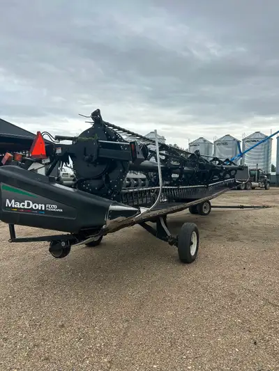 John Deere adapter. Contour buddy wheels, pea auger with updated center drive shaft like fd2 heads....