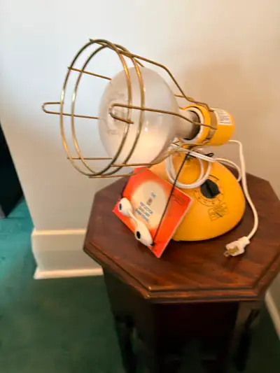 Antique sun tanning lamp complete with goggles and instruction manual, keep your tan year round in p...