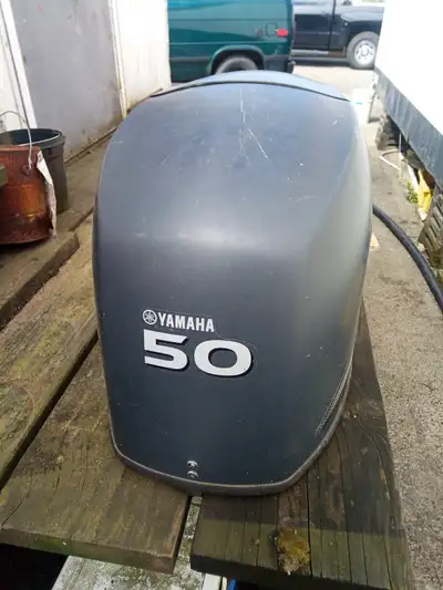 2013 engine cowling fits Yamaha 50hp Four Stroke outboard. A few scratches, Latch hardware good