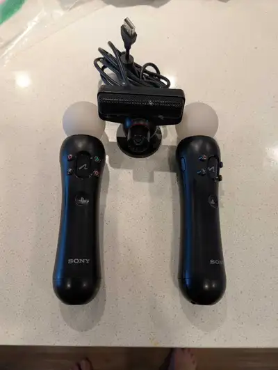 PlayStation 3 Move controllers and camera. , View more