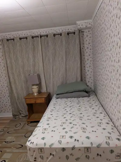 Furnish Room with a separate full bathroom for immediate occupation in a very quiet home. Please get...