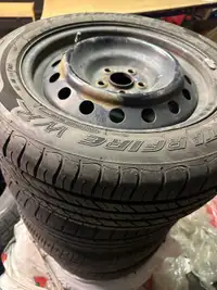 205/55R16x4 all season tires on rims.