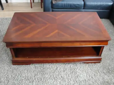 - wooden coffee table - very good condition - smoke free home - 2 drawers 26"W x 48"L x 18"H