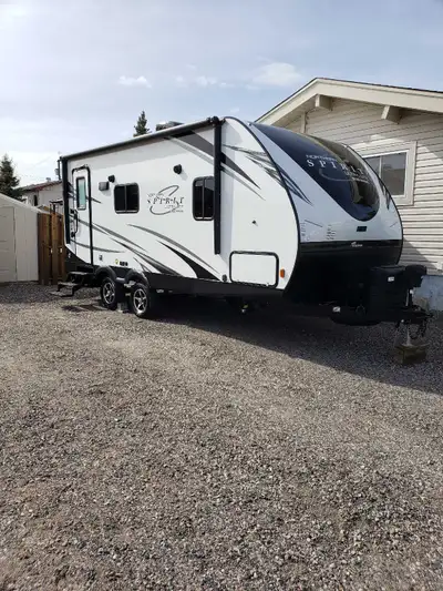 2019 Coachmen Northern Spirit 1943RB 24-foot ultralight couple's travel trailer featuring a rear bat...