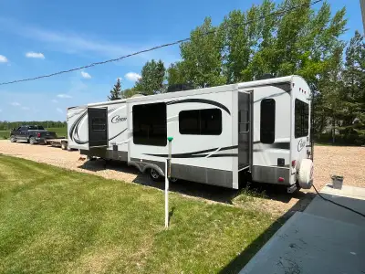 Listing for my father. 2014 Cougar High Country. 32’ very clean, no kids, interior like new. Camper...