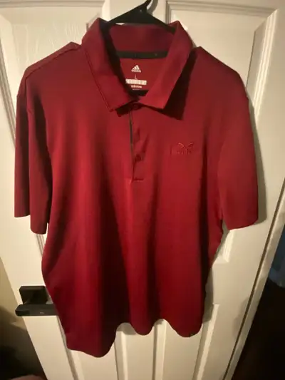 Any Golfer will know quality in game apparel This Adidas adidcross blue monster golf shirt, size L,...