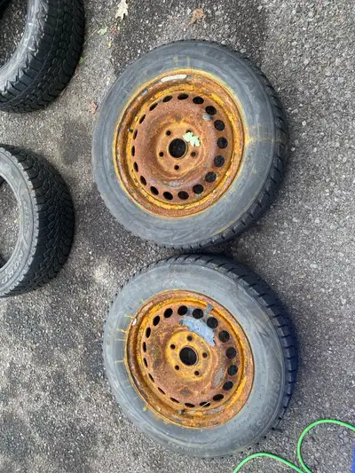 2 195/65/15 winter snow tires Bridgestone blizzak WS80 on rust 5x112 bolt pattern steel rims. Great...