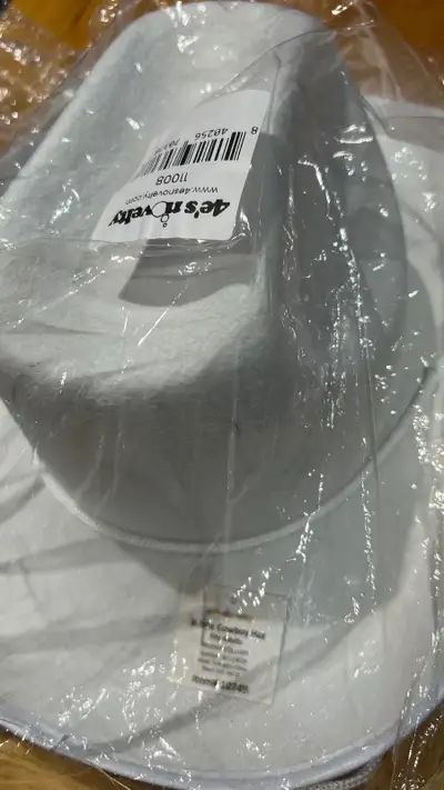 Brand new White cowboy hat for sale. Sealed. Pick up only.