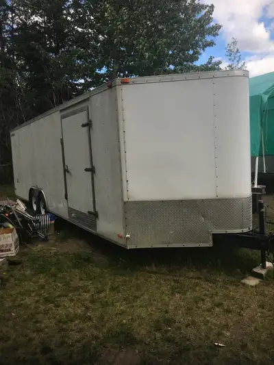 V nose enclosed car hauler. 9900lb gvw. Inside dimensions: 24 feet plus 2’ 3” at Vee 8’ inside width...