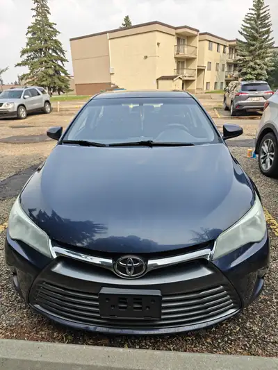 Toyota Camry LE 2016 (237401 kms) I am moving out of Canada and looking for immediate serious buyer...